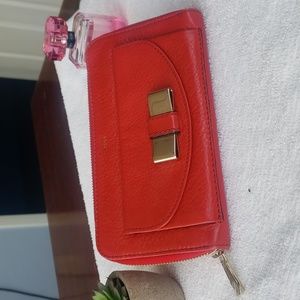 Chloe zippy long wallet Chopard bow